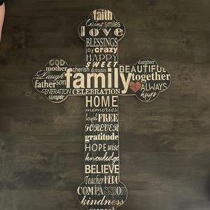 Cross with writing and heart